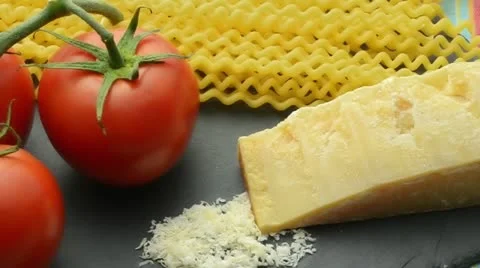 Background of tomatoes, cheese and pasta with rosemary Stock Footage 21907180
