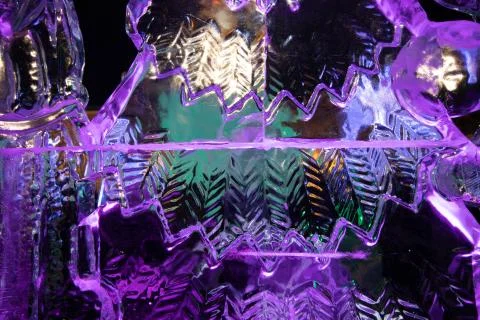 Background with transparent multicolored ice Stock Photos