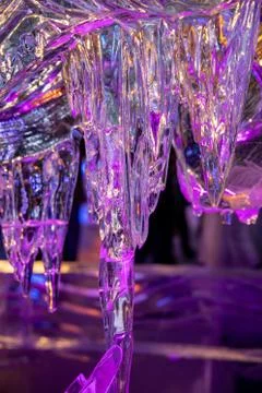 Background with transparent multicolored ice Stock Photos