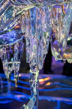 Background with transparent multicolored ice Stock Photos
