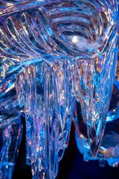 Background with transparent multicolored ice Stock Photos