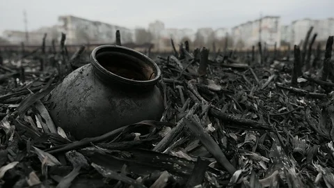Background of trash on ash field after a fire in Slowmotion. Dirty black glass Stockbeeldmateriaal 105545135