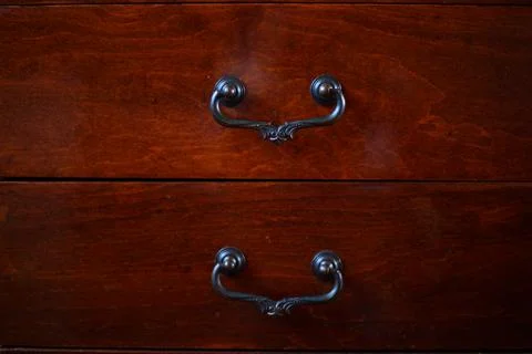 Background two drawers of a table made of brown walnut veneer 库存照片