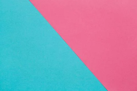 Background of two sheets of colored paper, pink and blue. Stock Photos