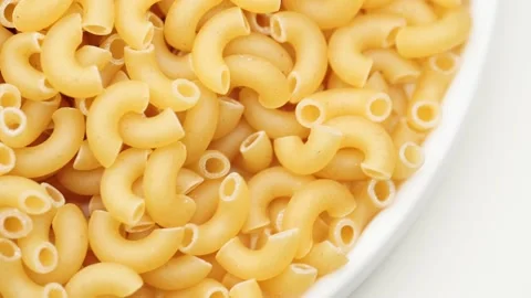 Background of Uncooked Noodles that Slowly Rotating. Texture of Dry Vermicelli T Stock Footage 234991291