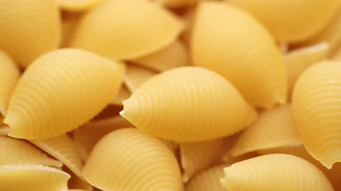 Background of Uncooked Noodles that Slowly Rotating Stock Footage 234992215