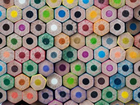 Background of unsharpened bottoms of multi colored pencils Stock Photos