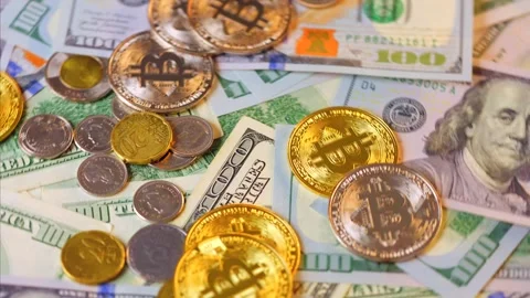 Background with US Dollar and Euro bills, BTC bitcoins rotating Video stock 339628774