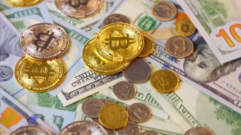 Background with US Dollar and Euro bills, BTC bitcoins rotating Video stock 343446741