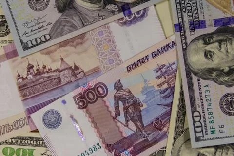 Background of the us dollars and russian rubles Stock Photos