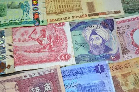 Background of various banknotes from different countries like Iraqi dinars,.. Stock Photos