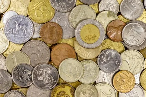 Background of various coins from different countries Stock Photos