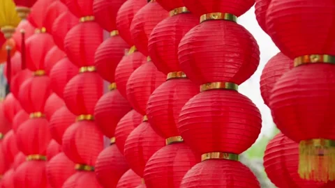 Background video of clusters of red Chinese lanterns hanging side by side. Stock-Footage 335115165