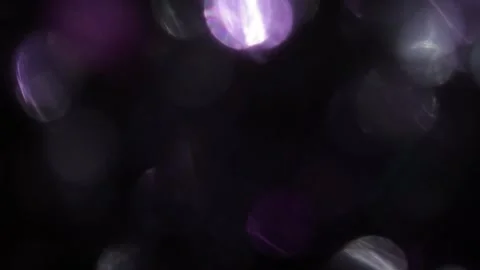 Background video with soft abstract motion pattern of white and purple bokeh lig Stock Footage 317449291