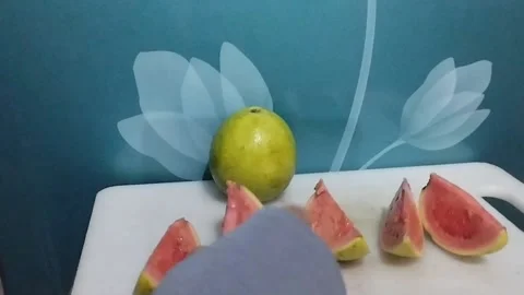 Background view of red crystal guava slices Stock Footage 229255438