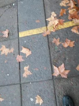 Background walking on a sidewalk with different elements in daylight Stock Photos