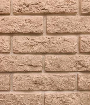 Background of the wall is a brown brick surface. Abstract wall background Stock Photos
