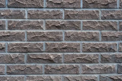 Background wall of decorative brown bricks Fotos de archivo