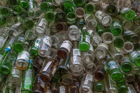 Background wall from empty bottles Stock Photos
