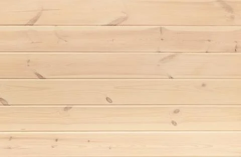 Background wall of horizontal textured pine planks in warm pastel color Stock Photos