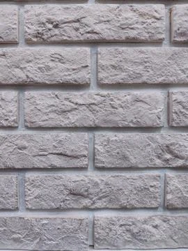 The background of the wall is a light-colored b Stock Photos