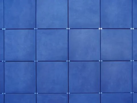 Background of wall  made of blue square tiles Stock Photos