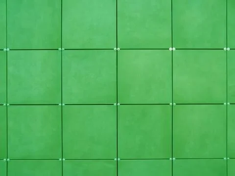 Background of wall  made of green square tiles Stock Photos