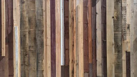 The background wall is made of old used boards of different sizes in different Stock Photos