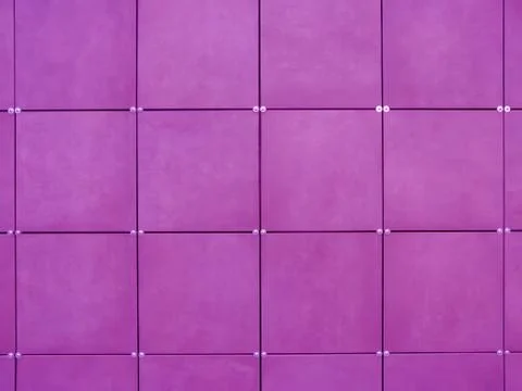 Background of wall  made of purple square tiles Stock Photos