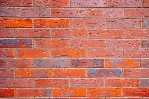 Background. a wall of orange brick. Building. Foto stock