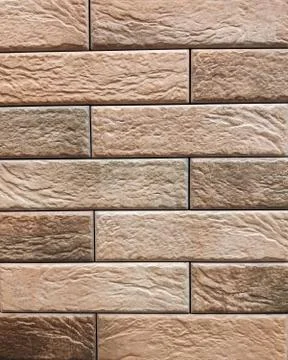 The background of the wall is a red brick surface. Abstract wall background Stock Photos