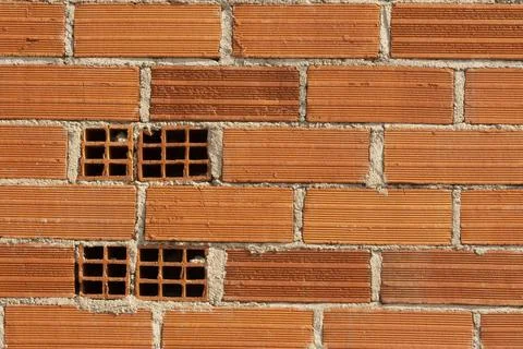 Background of a wall of red bricks with cement, France Stock Photos
