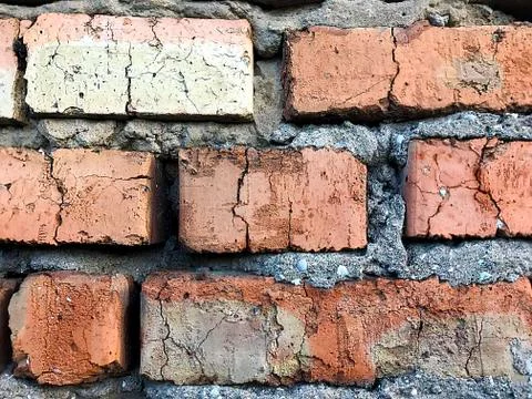 Background - a wall of red bricks. Stock Photos