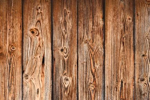 The background of the wall with the texture of boards painted with orange pai Stock Photos