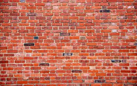 Background on wall texture. Bricks in redbrick masonry. Wall on surface pat.. Stock Photos