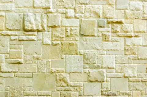 Background Wall Texture covered with natural stone fragments with an attrac.. Stock Photos