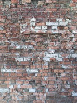 Background wall of torn brick. Stock Photos