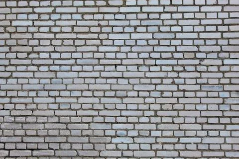 Background wall of white bricks laid with cement Stock Photos
