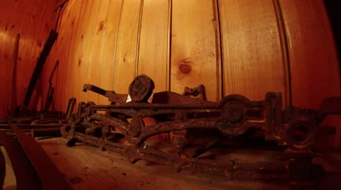 On the background wall of wood wrought old mechanism Stock Footage 45389365