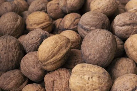 Background of walnuts close up. A full source of vegetable protein in the veg Stock-Fotos