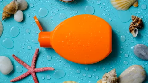 Background with water drops and sunscreen. Selective focus. Stock Footage 202640407