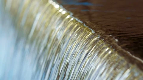 Background with water flow close-up. Clear water stream, quiet waterfall. Stock Footage 117135046