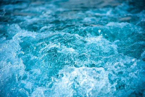 Background of water splash wave surface behind of fast moving motor speed boa Stock Photos