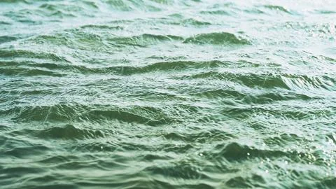 Background of waves on the blue sea Stock Photos