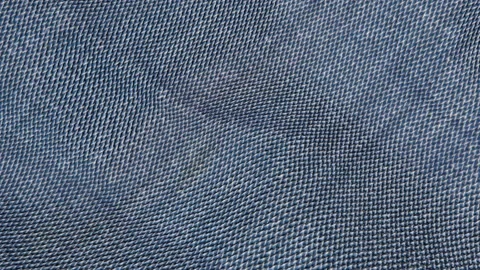 Background of waving blue denim with stripes. 3d render Stock Footage 140077532