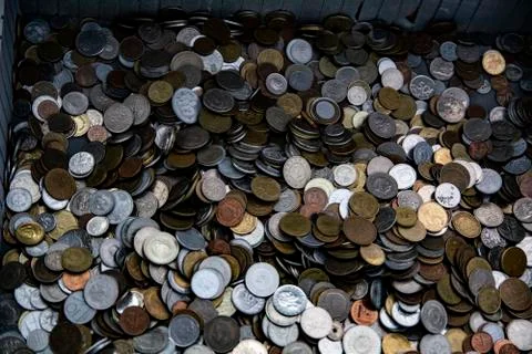 The background on which a large number of different coins Stock Photos
