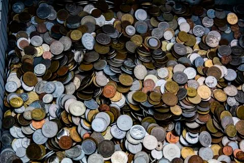 The background on which a large number of different coins Stock Photos