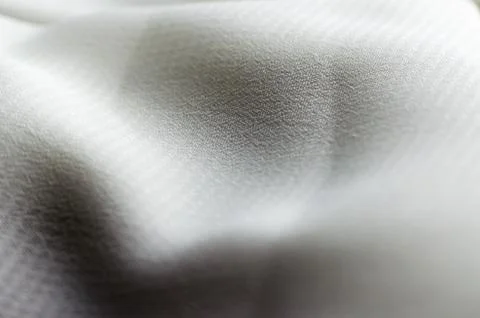 Background from white fabric with shadows Stock Photos