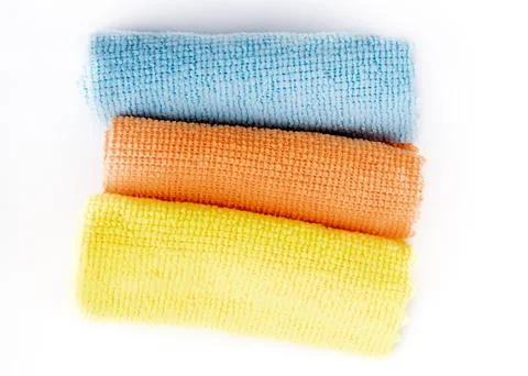 Background. white. microfiber cloth. there is a small shadow. close-up Stock Photos