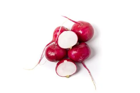 Background, white. the red radish inside is one cut in half. Stock Photos